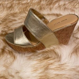 Nine West slip on platform shoe.A touch of gold to dress up or down. Pics height